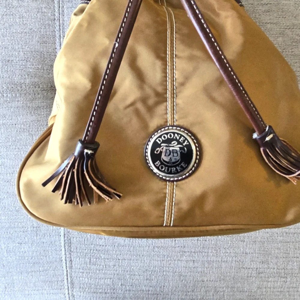Dooney & Bourke Copper Wayfarer Drawstring Bucket Bag - Picture 2 of 8